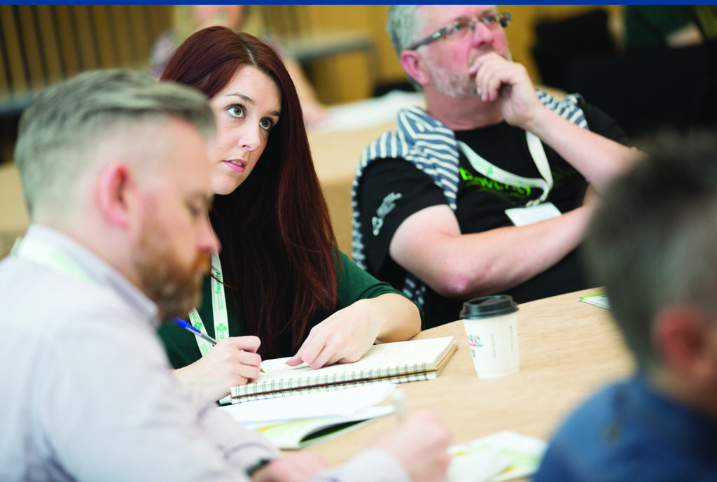 Delegates listening to conference