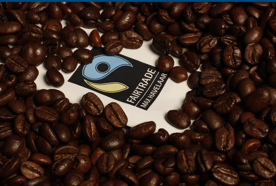 Fair Trade Logo with Coffee Beans Scattered