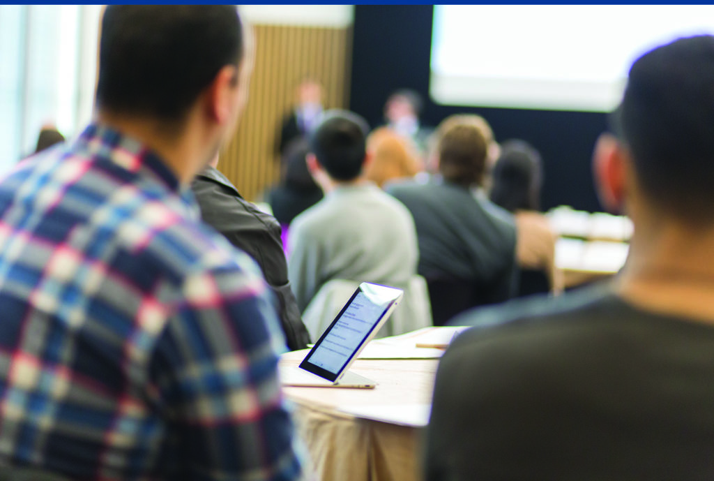 Delegates in conference room