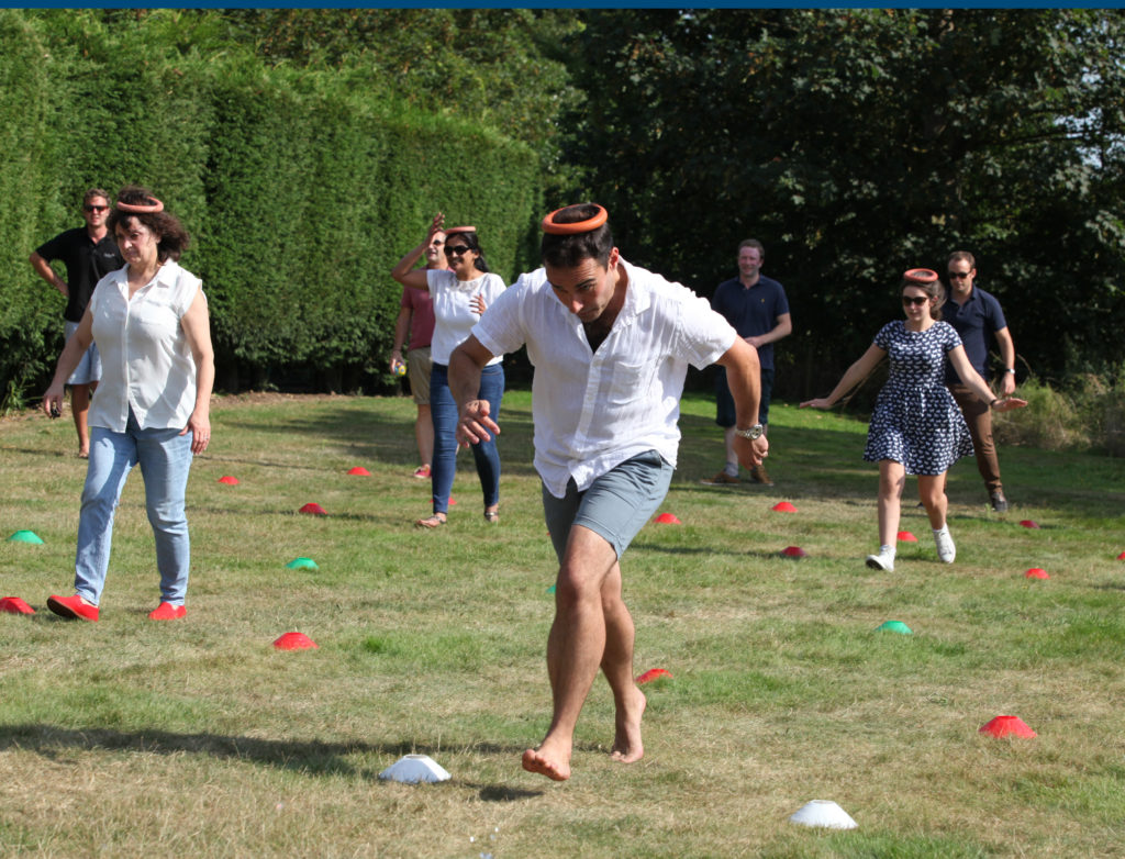 Large group completing school sports day team building obstetrical course