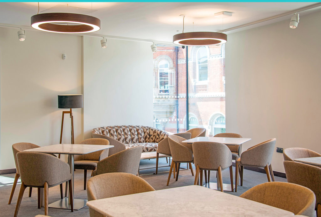 Stunning new dining area in University Hall with cosy sofas, tables and chairs and circular lighting